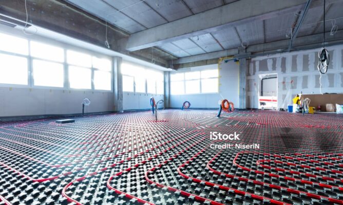 Floor heating in a new building. Interior design and finishing industry. Office and apartment
