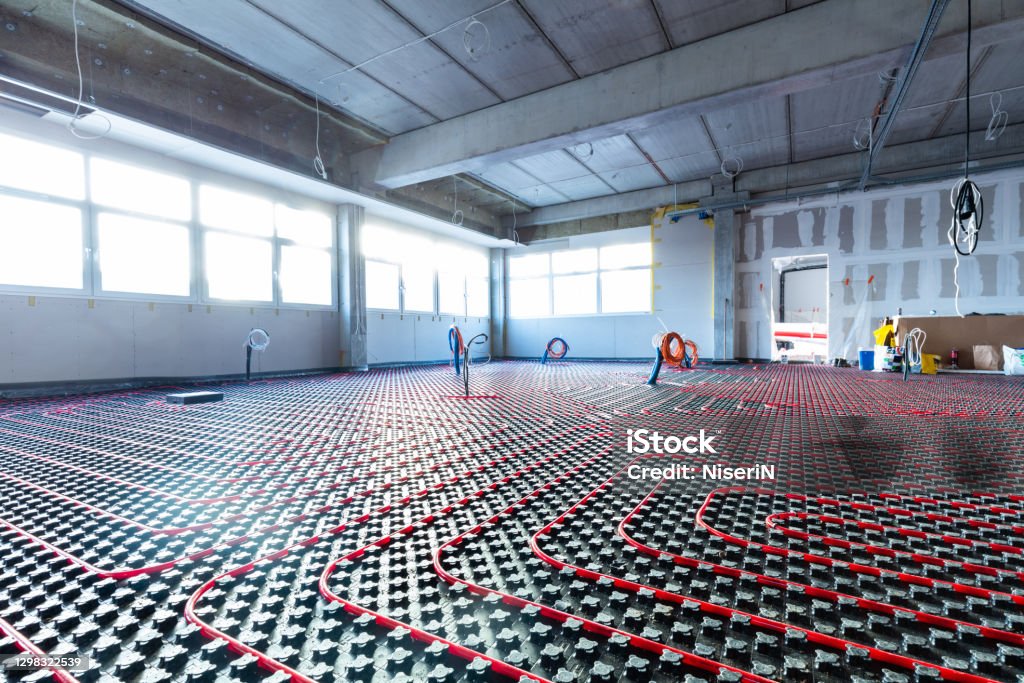 Floor heating in a new building. Interior design and finishing industry. Office and apartment